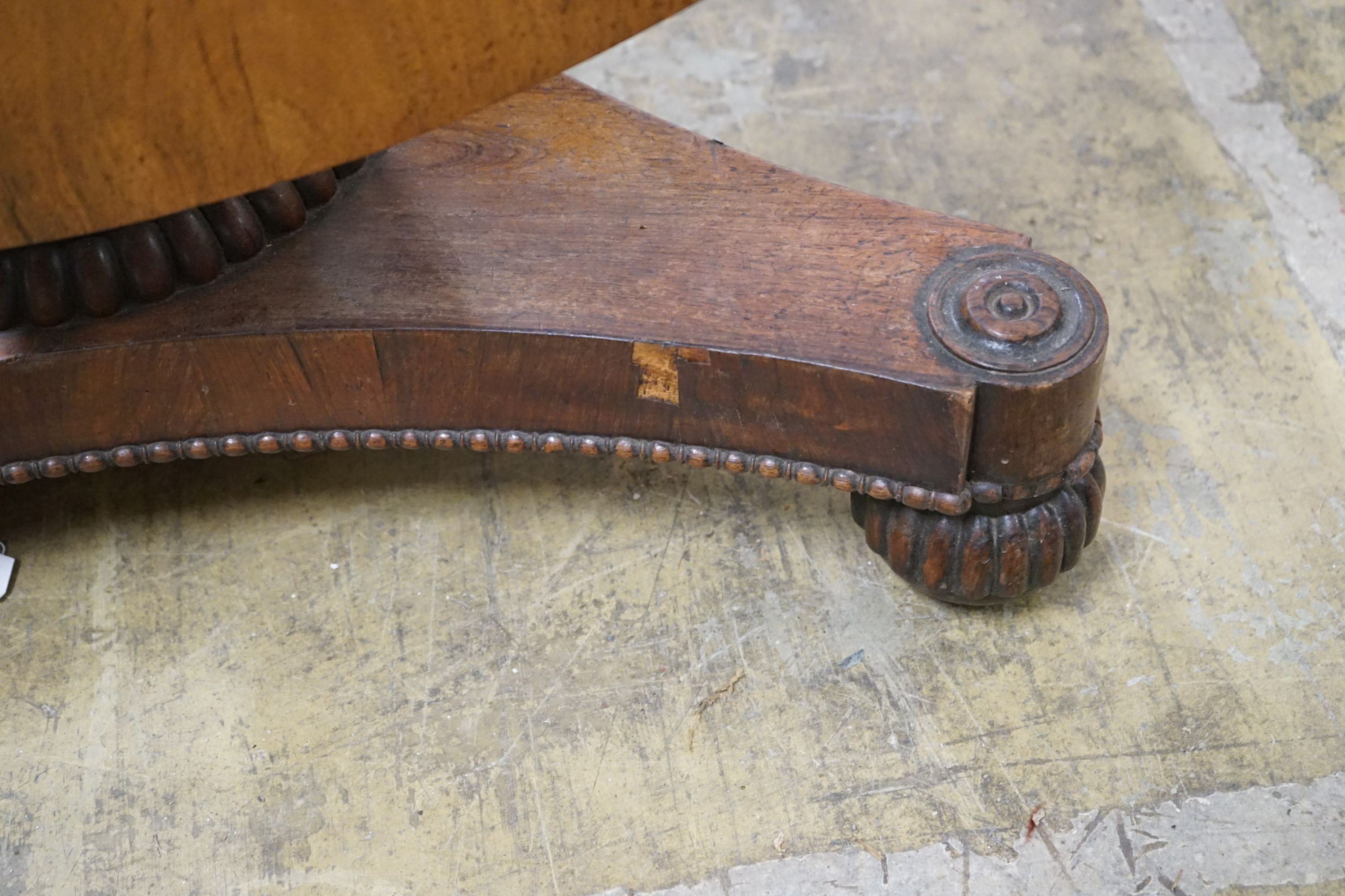 A Regency circular rosewood tilt top breakfast table, diameter 120cm, height 76cm